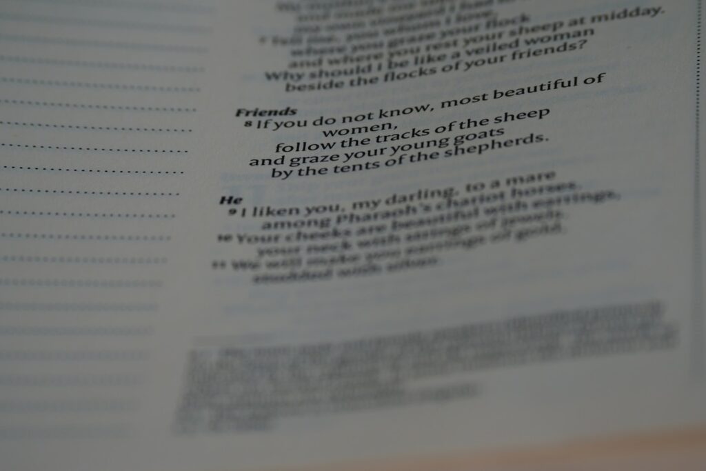 close up, bokeh, macro, blur, blurred background, close focus, bible, old testament, hebrew bible, christian, judaism, history, text, reading, bible study, devotions, text, NIV, New International Version, type, typography, canon, christianity, holy scripture, holy bible, scripture, old testament, hebrew bible, song of songs, שִׁיר הַשִּׁירִים, Šīr hašŠīrīm, ᾎσμα ᾀσμάτων, Âisma āismátōn, canticle of canticles, megillot, tanakh, ketuvim, poem, love poem, love poetry, passover, christ, bride, church, marriage, lovers,